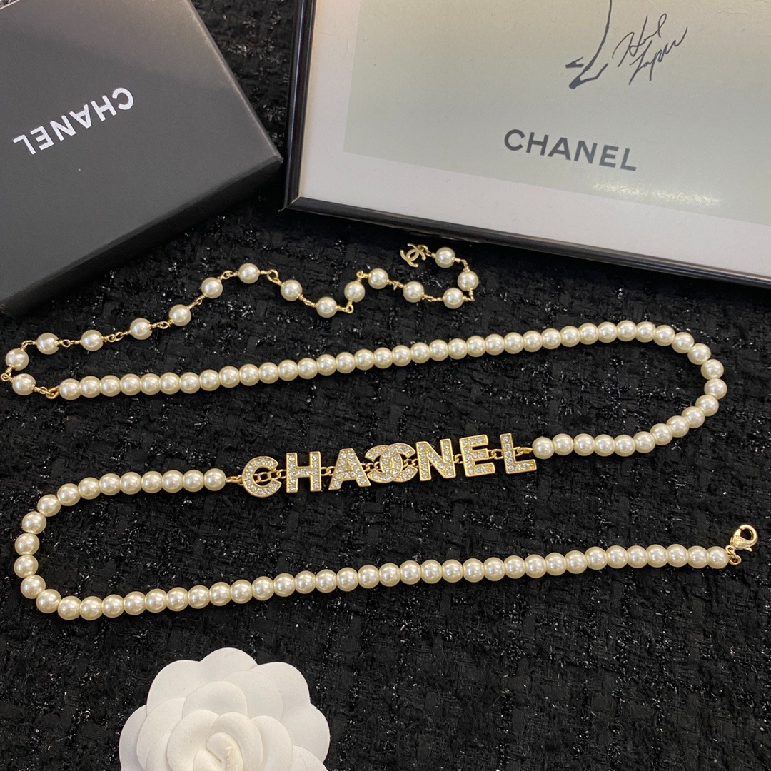 Ch**el Pearl And Crystal Logo Gold Tone For Women