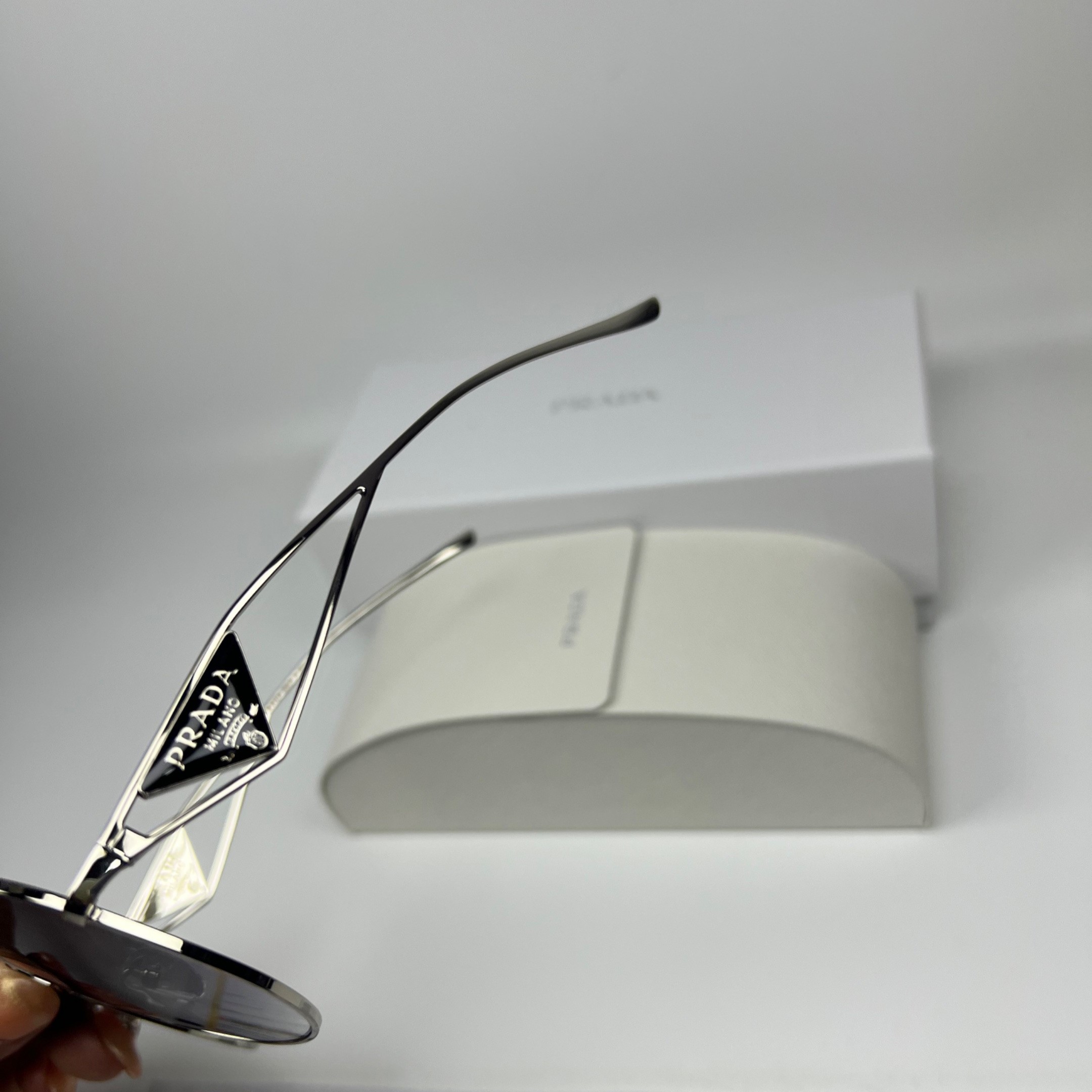 Pra*a Sunglasses With Triangle Logo Silver For Women